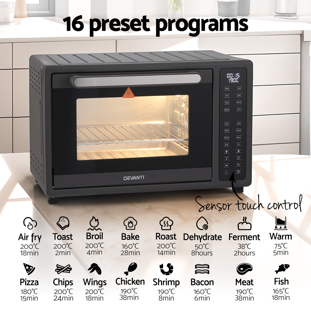 Black Devanti oven with digital display on a kitchen counter, showing preset programs.