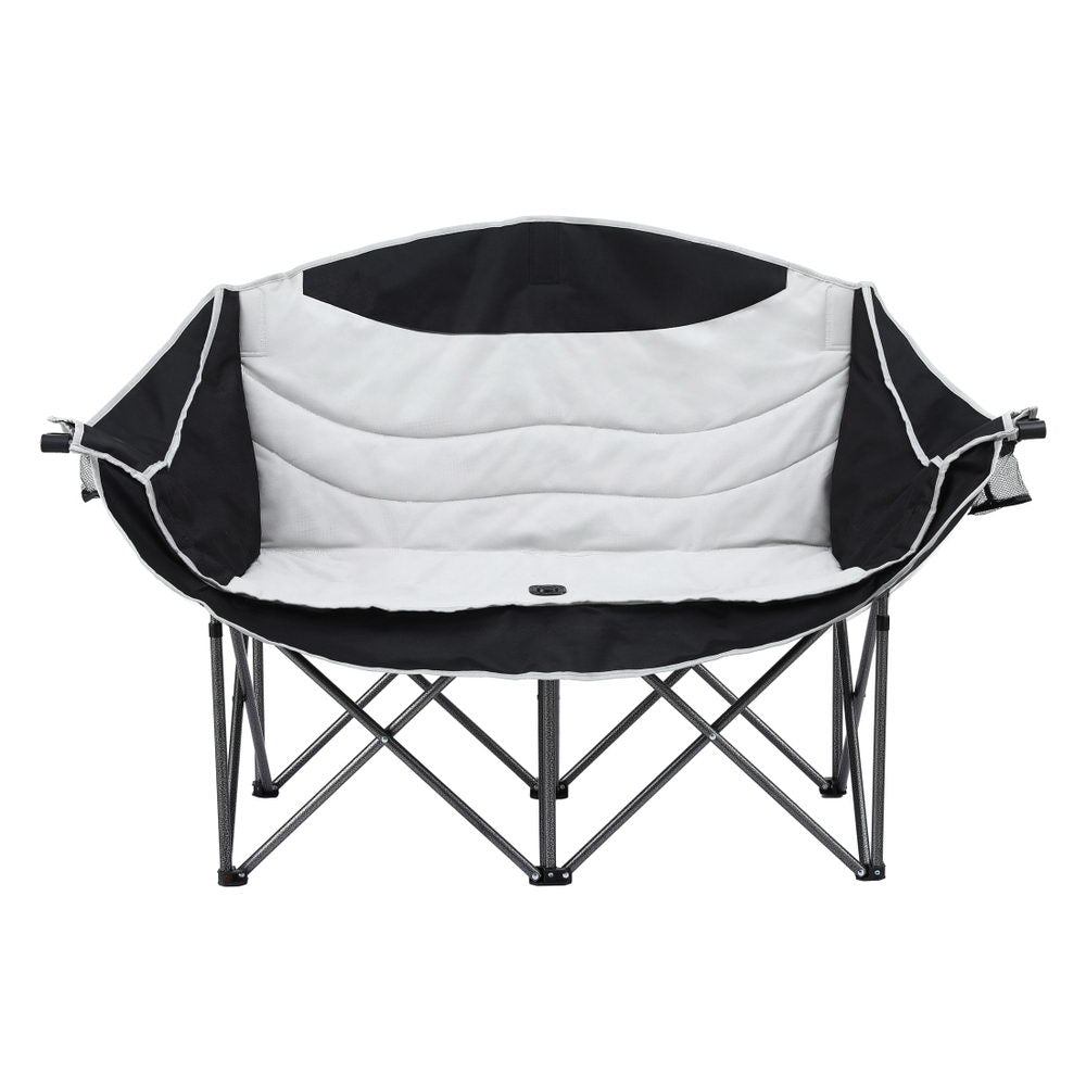 Black and white folding chair on a white background