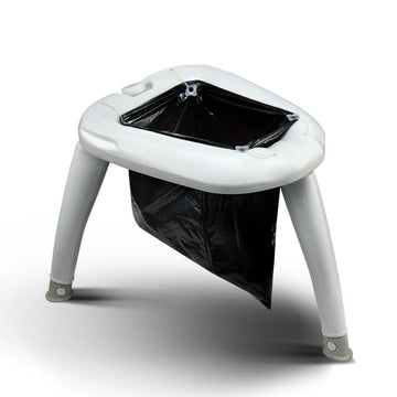 White plastic stool with a black trash bag inside on a white background