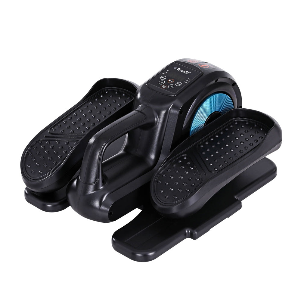 Black stepper exercise machine on a white background