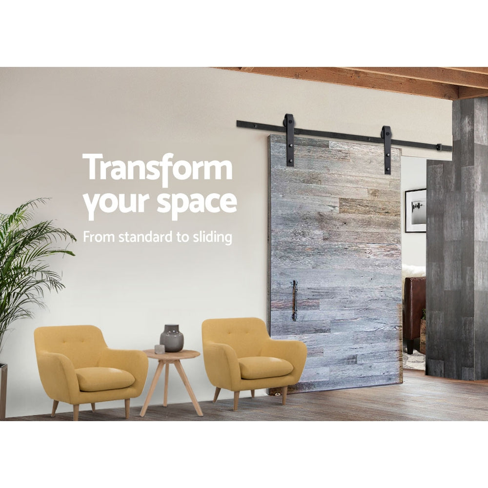 Modern interior with sliding barn door and yellow armchairs, text 'Transform your space'.