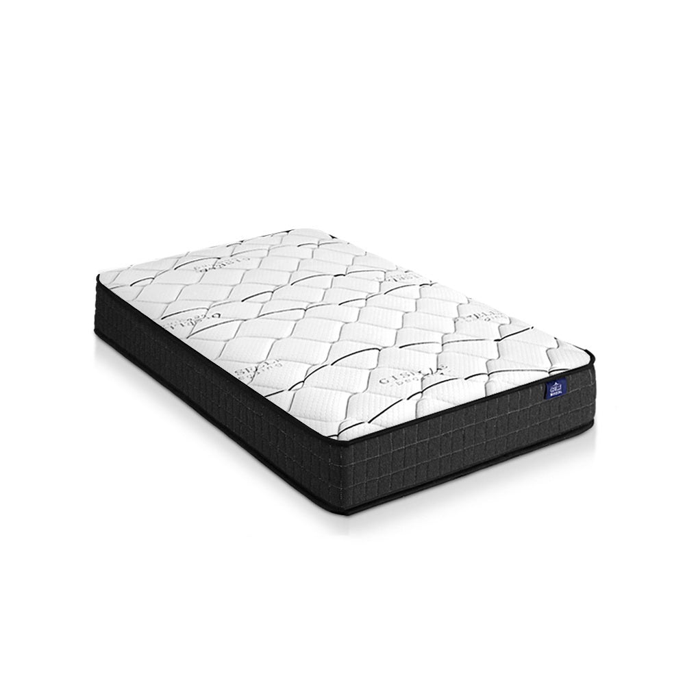 Mattress with white quilted cover and black frame on a white background