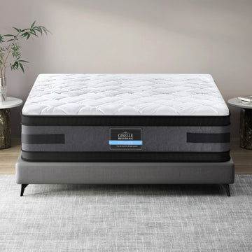 Gray mattress with Giselle Bedding label in a room setting