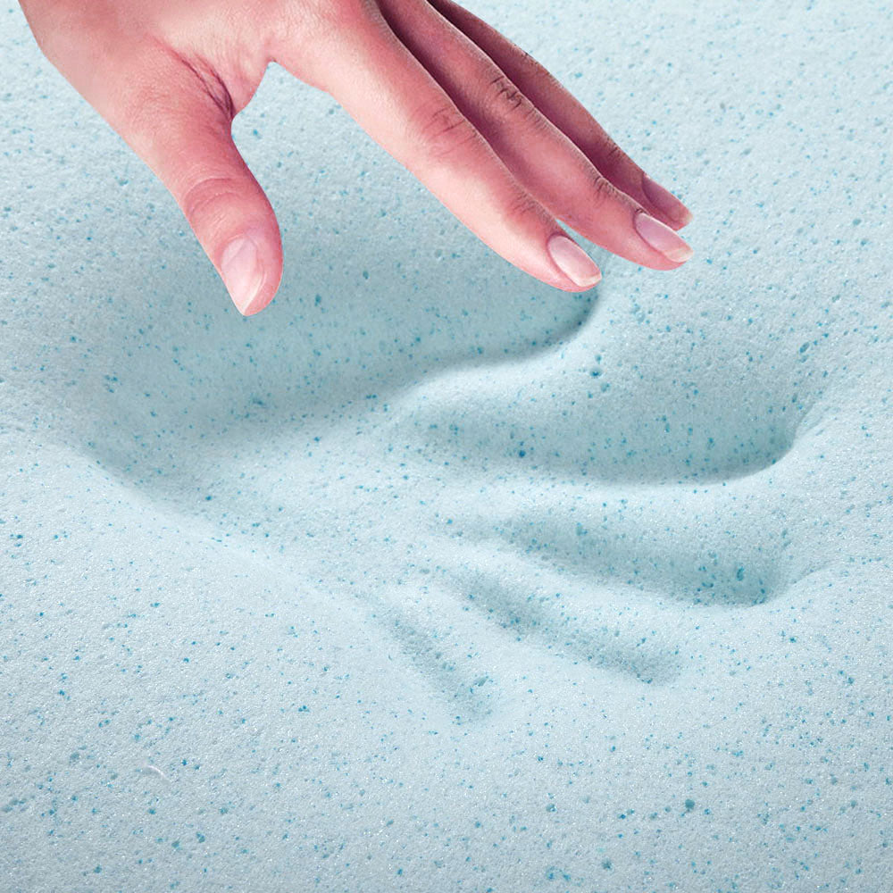 Hand pressing into a textured blue surface