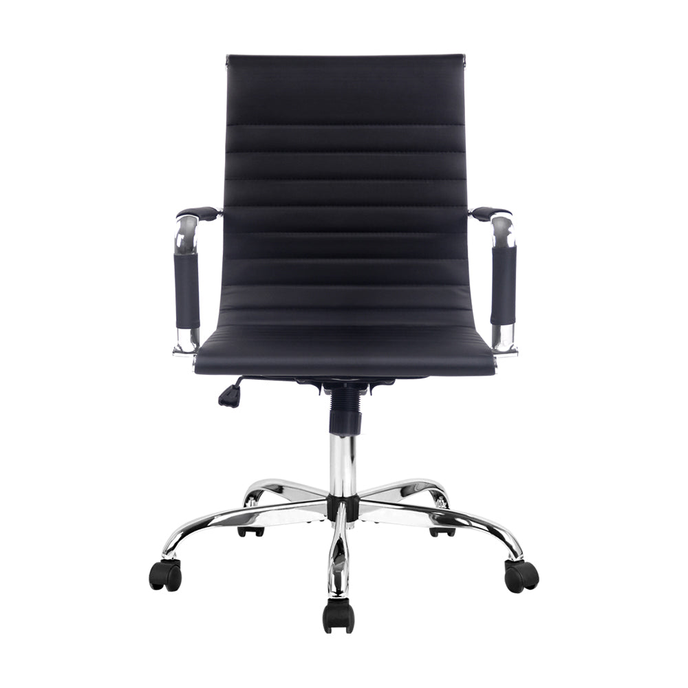 Black office chair with ribbed backrest on a white background
