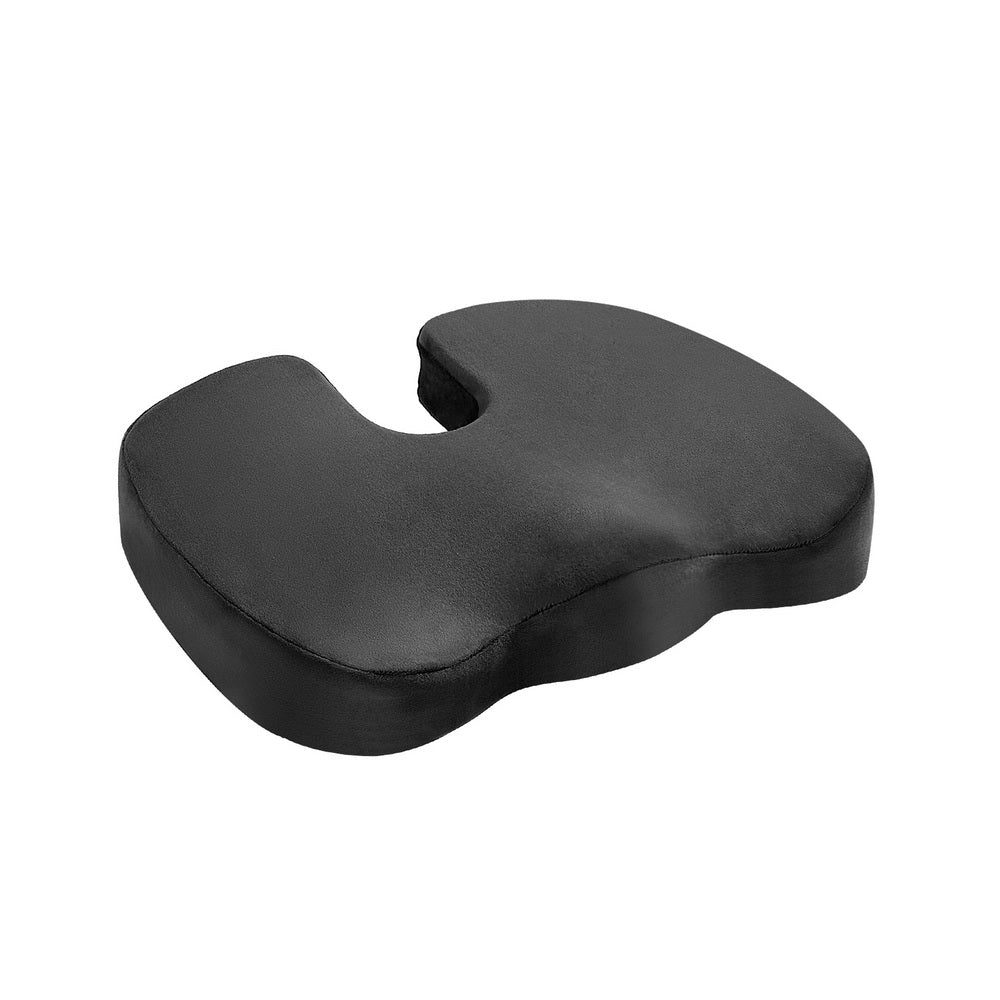 Black ergonomic seat cushion on a white background