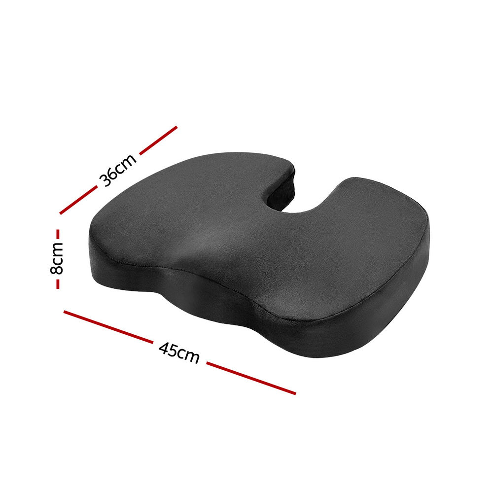 Black cushion with measurements on a white background