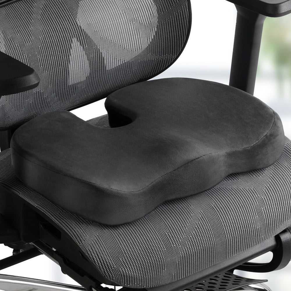 Gray memory foam seat cushion on an office chair