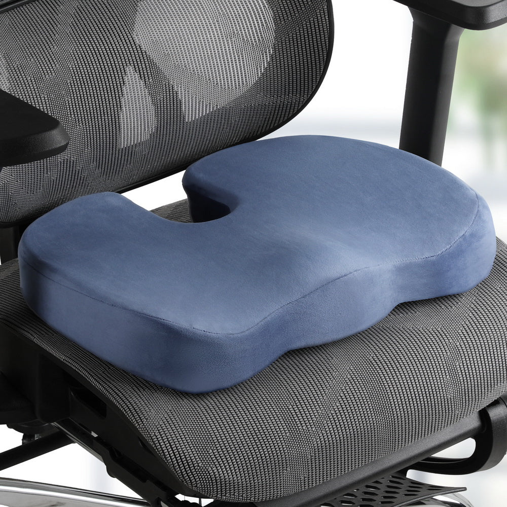 Blue ergonomic seat cushion on a office chair