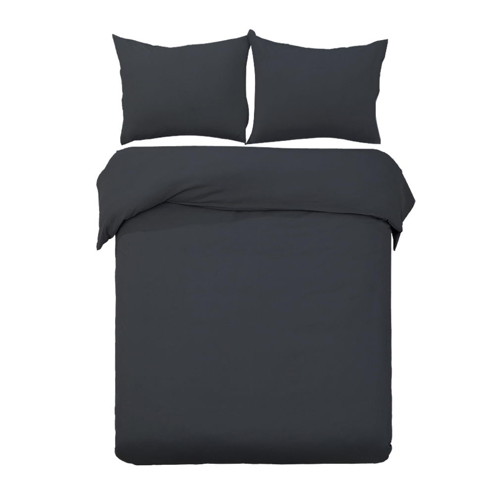 Black bedding set with two pillows on a white background