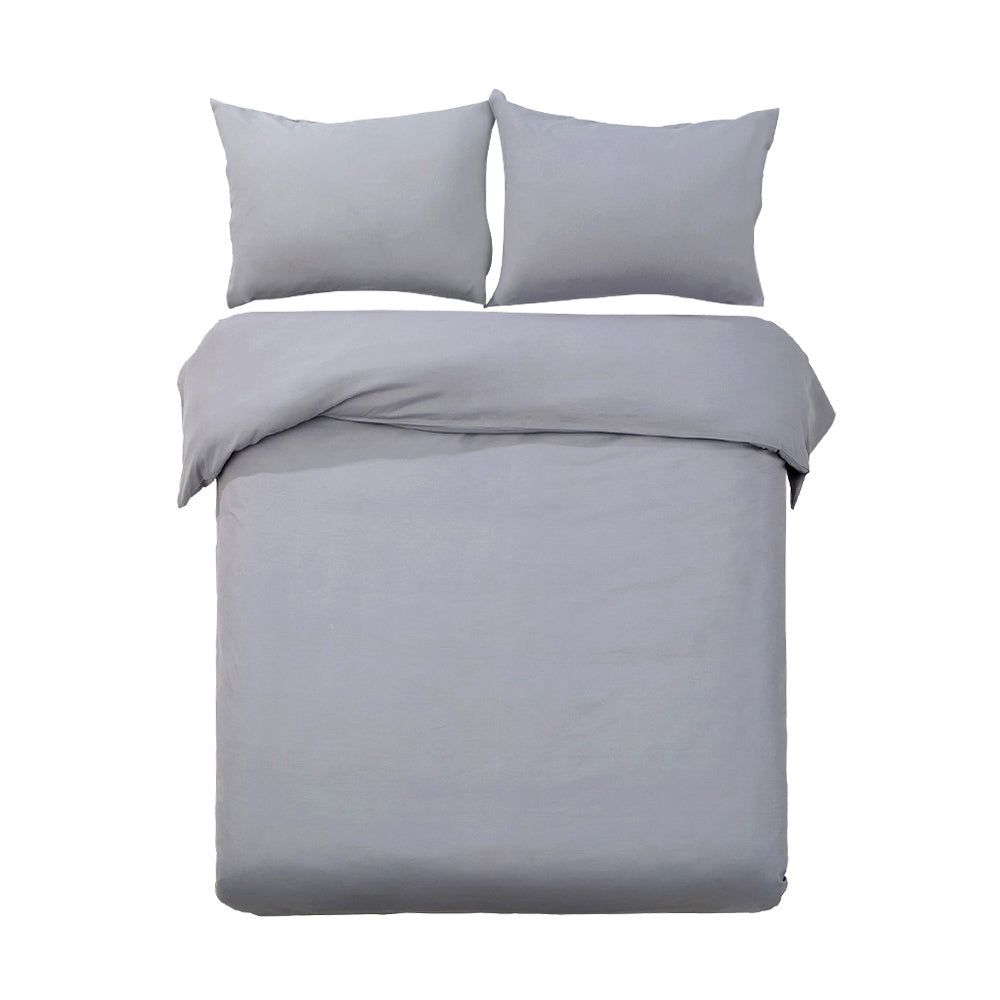 Gray bedding set with two pillows on a white background