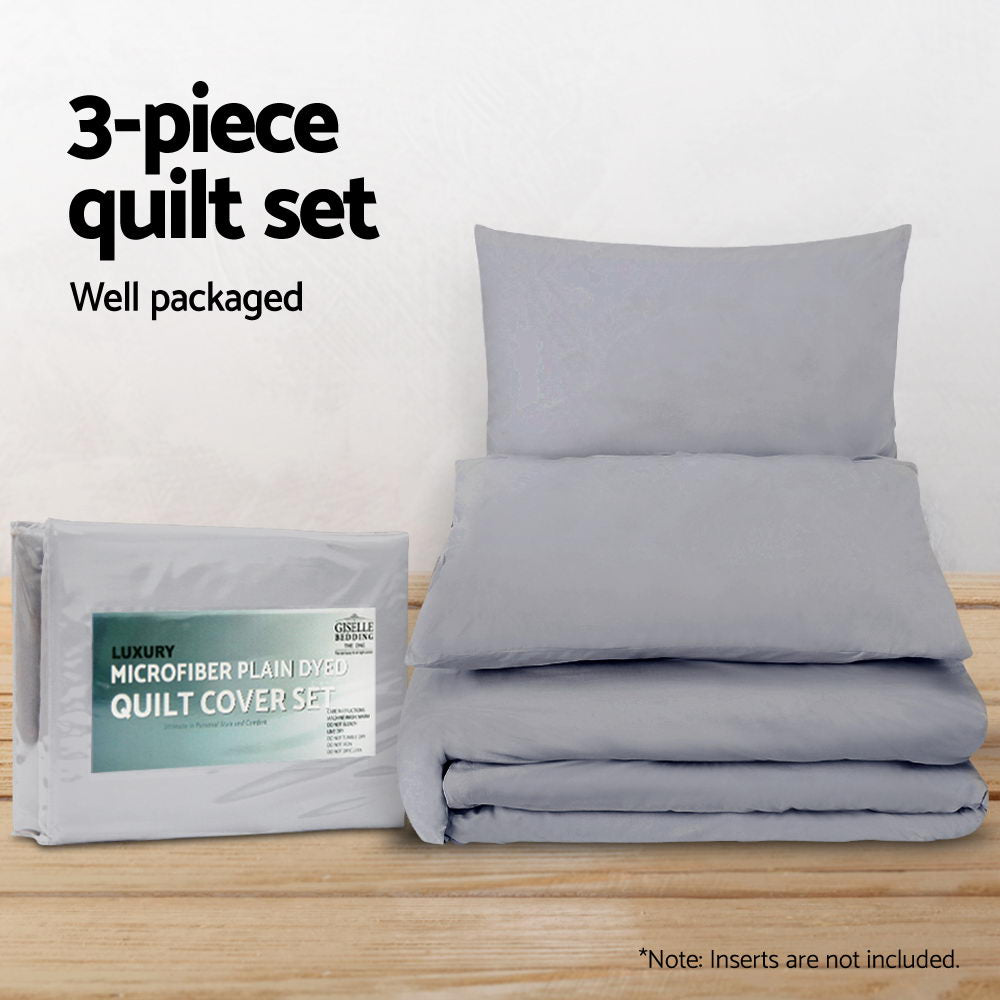 3-piece quilt set with packaging on a wooden surface