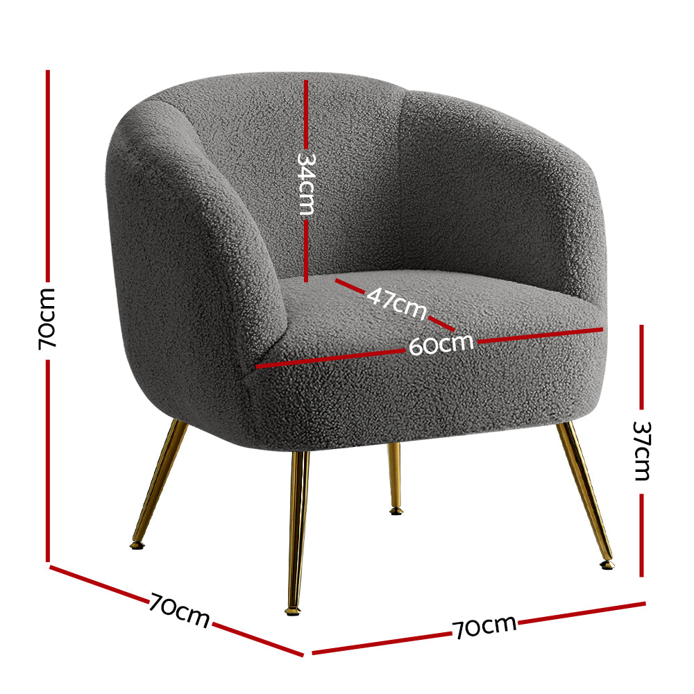 Gray armchair with gold legs and dimensions marked on a white background