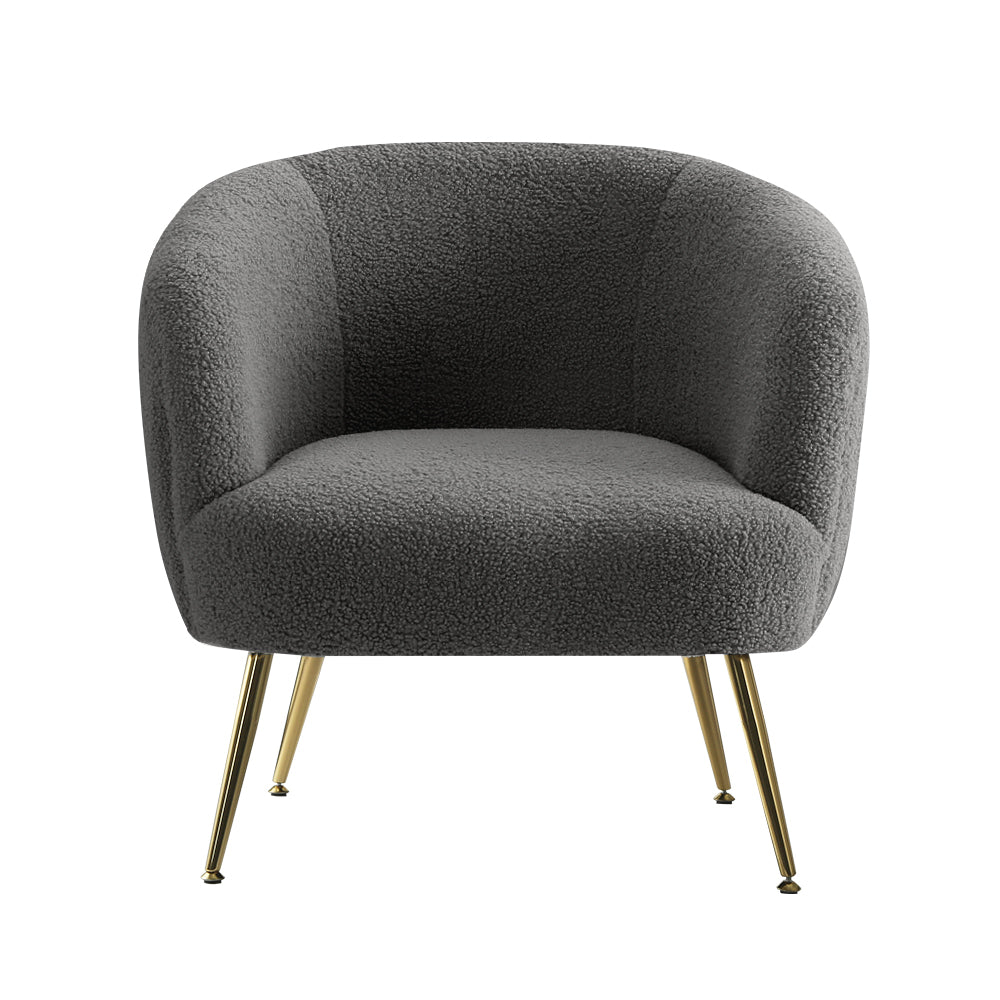 Gray textured armchair with gold legs on a white background