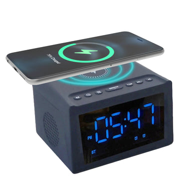 Digital clock with wireless charging pad on a white background