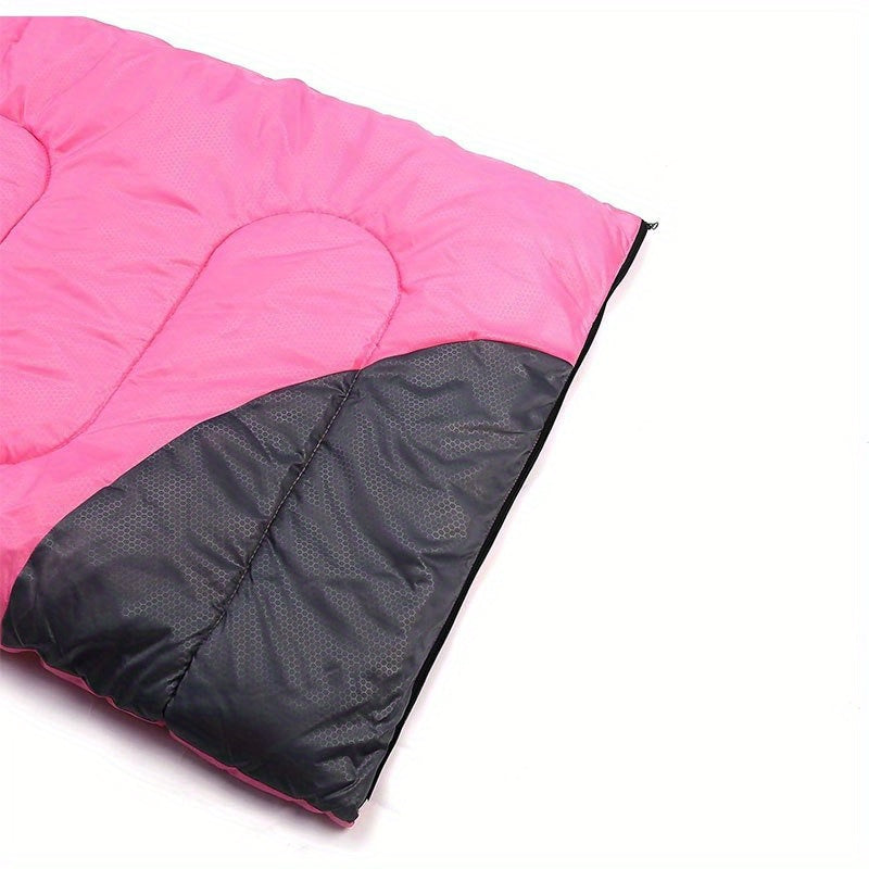 Pink and black sleeping bag on a white background