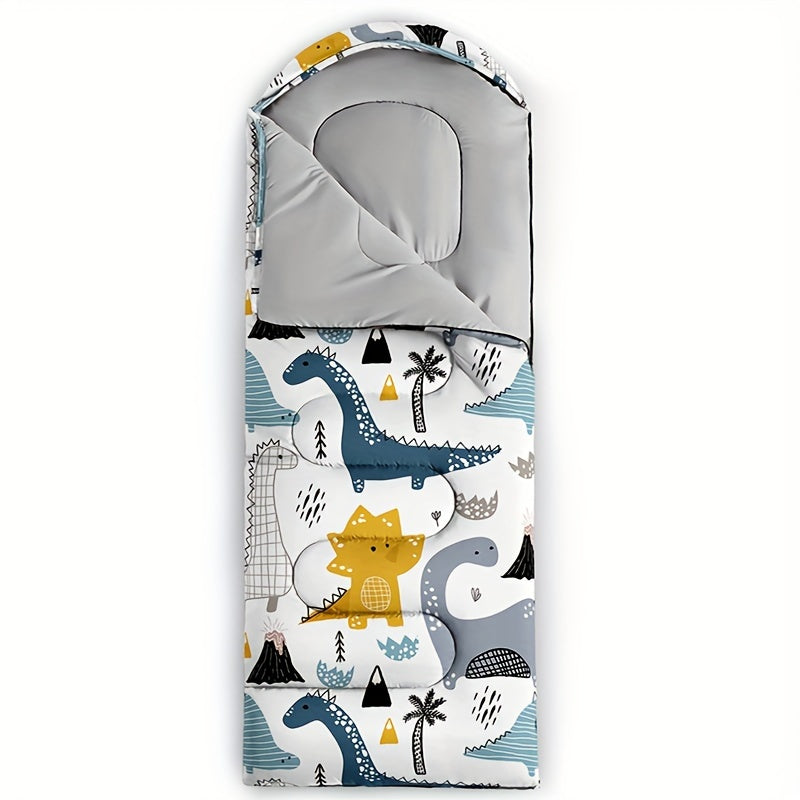 Children's sleeping bag with dinosaur pattern on a white background