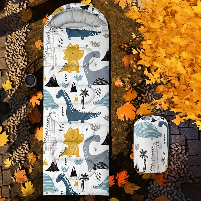 Children's sleeping bag with dinosaur pattern on a natural background