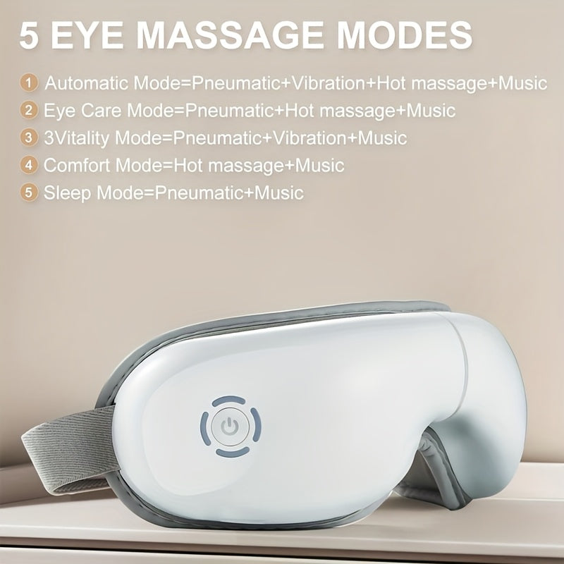 Eye massager with 5 massage modes on a beige background