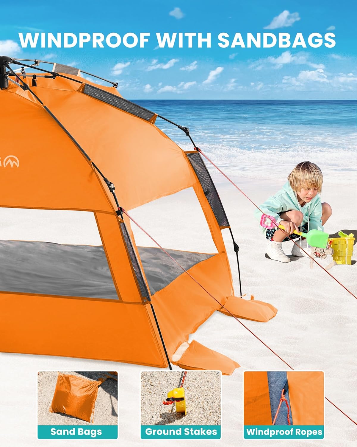 Orange tent with sandbags on a beach, child playing nearby