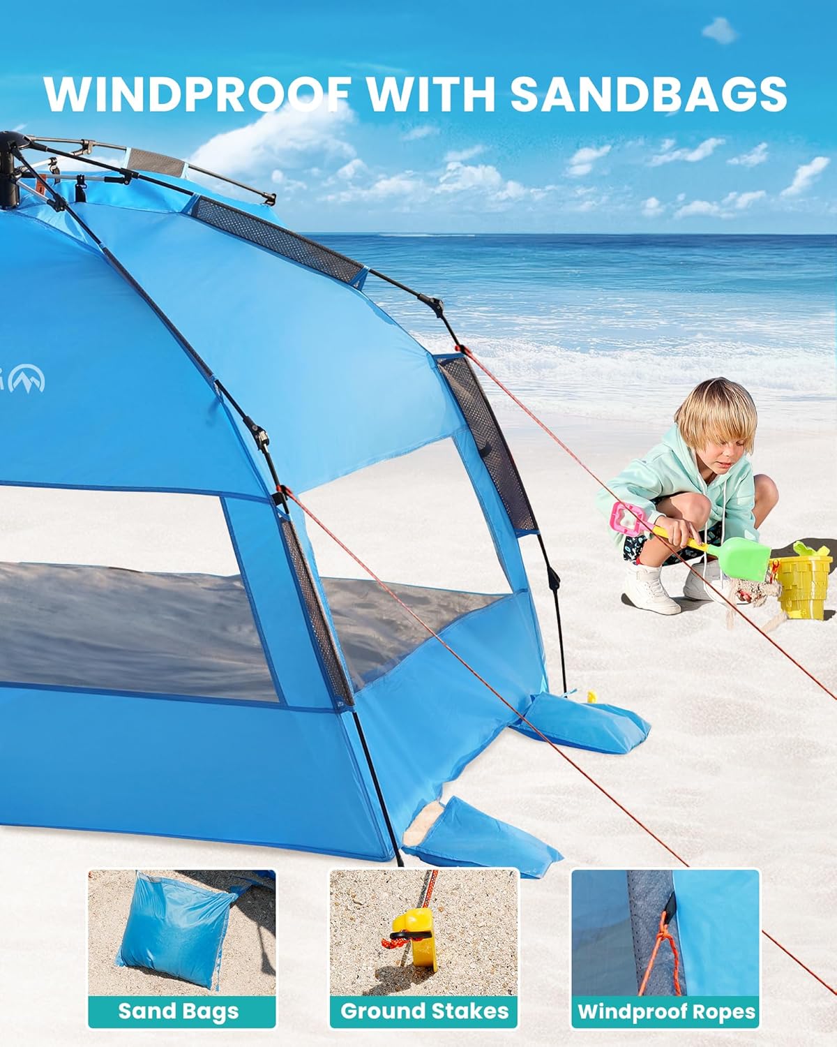 Blue tent with sandbags on a beach, child playing nearby