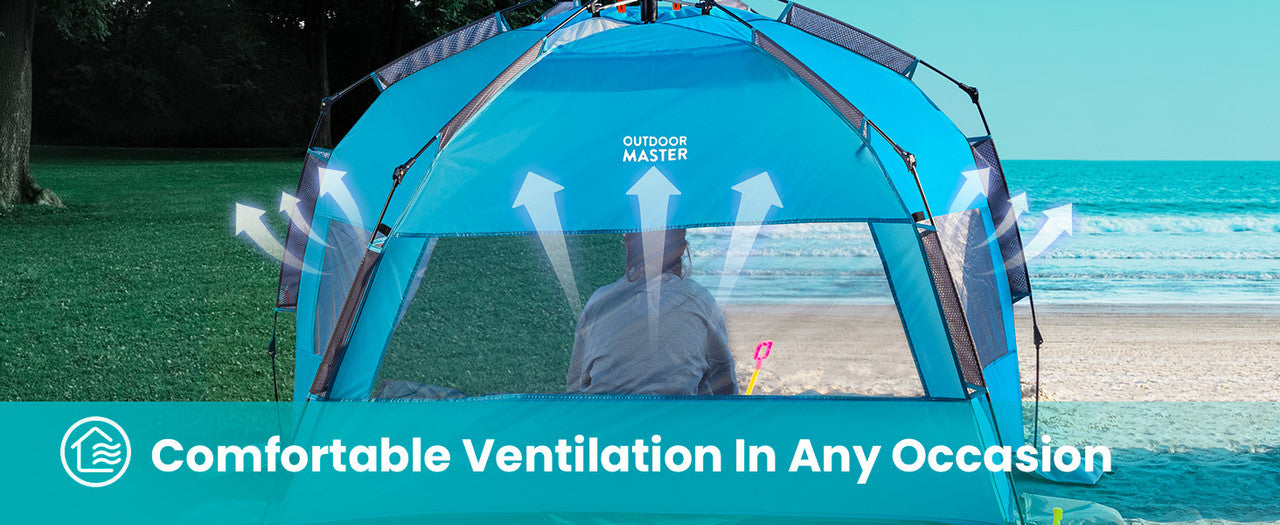 Blue camping tent with ventilation system on a beach