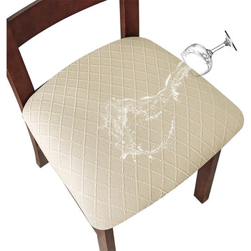 Beige chair pad with a wine glass being poured on it, on a white background