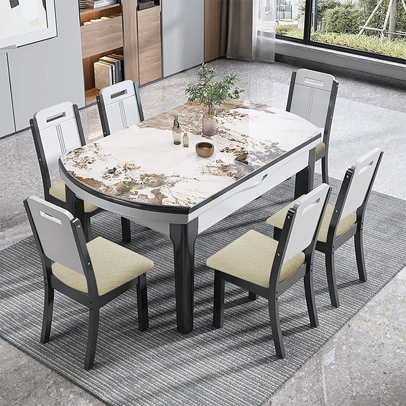 Dining table set with six chairs in a modern room.
