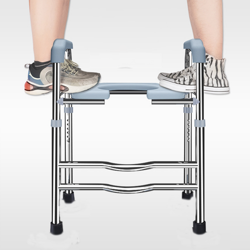 Person using a metal step stool with blue steps on a white background