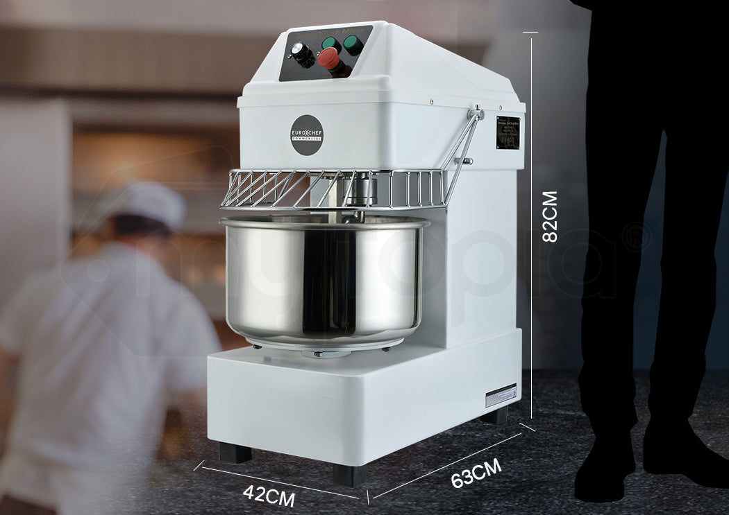 Bread mixer with dimensions displayed, blurred background of a bakery.