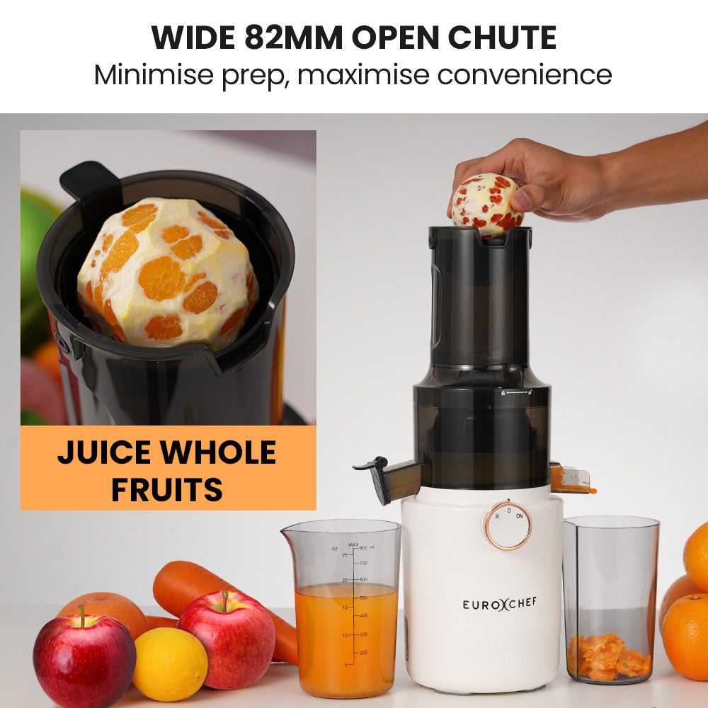 Juicer with a wide 82mm open chute, surrounded by fruits and a glass of juice, with text highlighting its features.