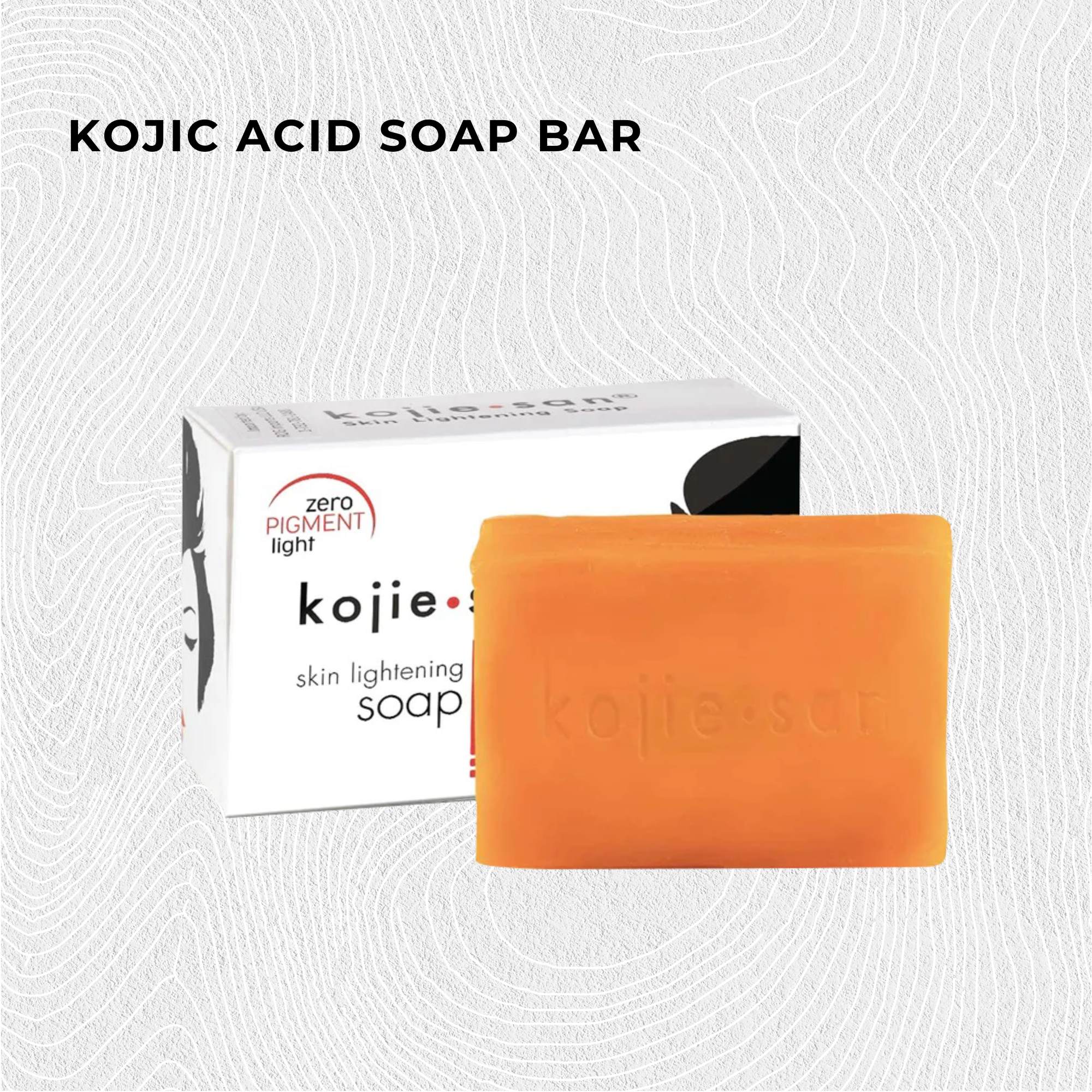 Kojie Sanada kojic acid soap bar with packaging on a light gray background