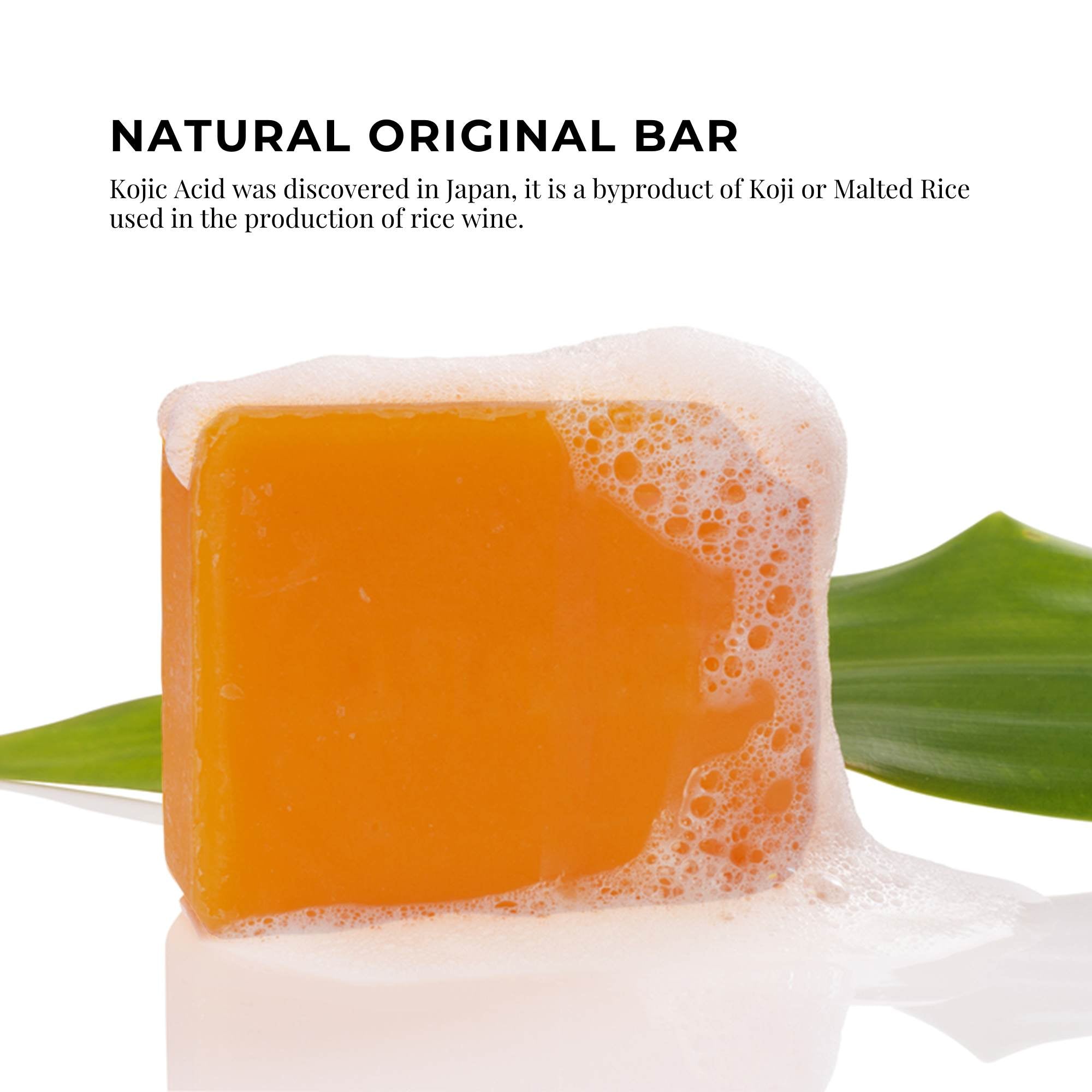 Orange soap bar with foam on a white background