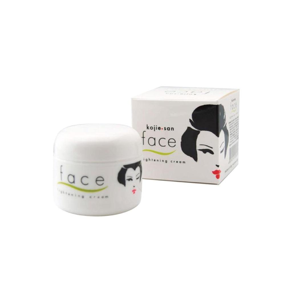 Kojie San face lightening cream jar and packaging on a white background