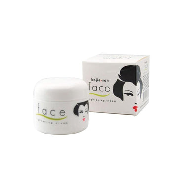 Kojie San face lightening cream jar and packaging on a white background