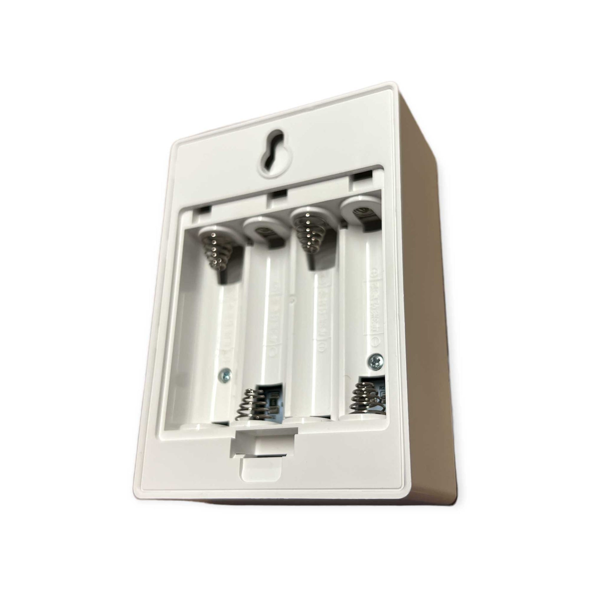 White electronic device with metallic components on a white background