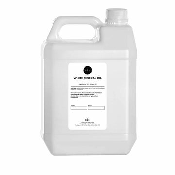 White mineral oil container with a label on a white background