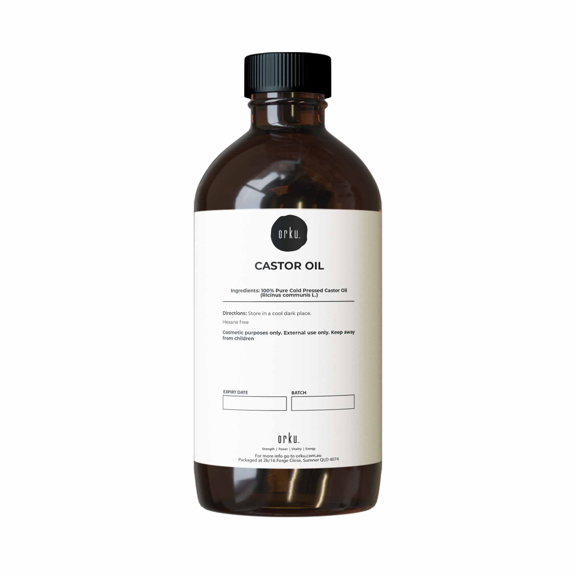 Brown bottle of castor oil with a white label on a white background