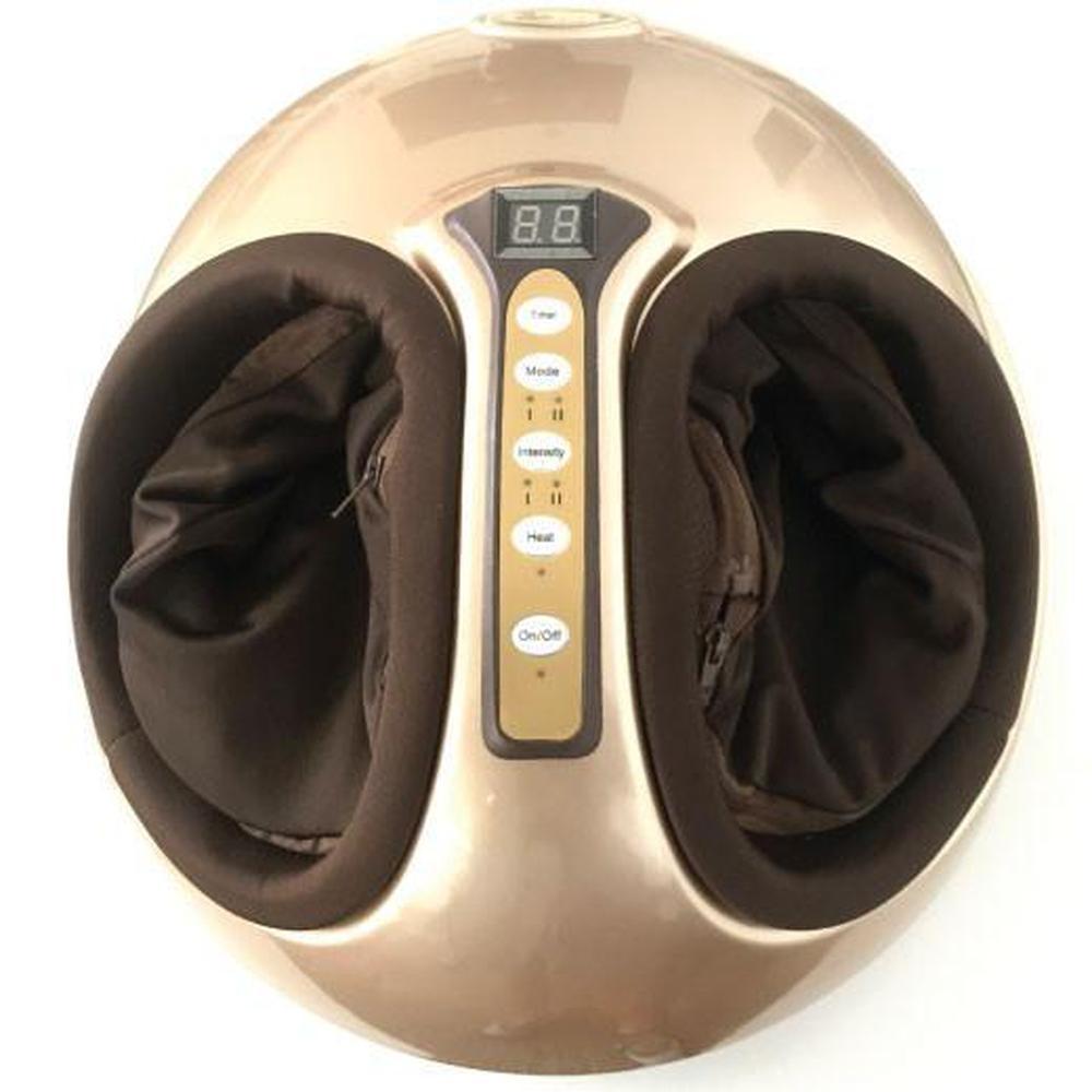 Gold and black foot massager on a white background
