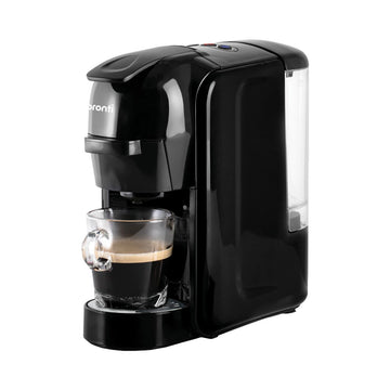 Black coffee machine with a clear glass cup on a white background