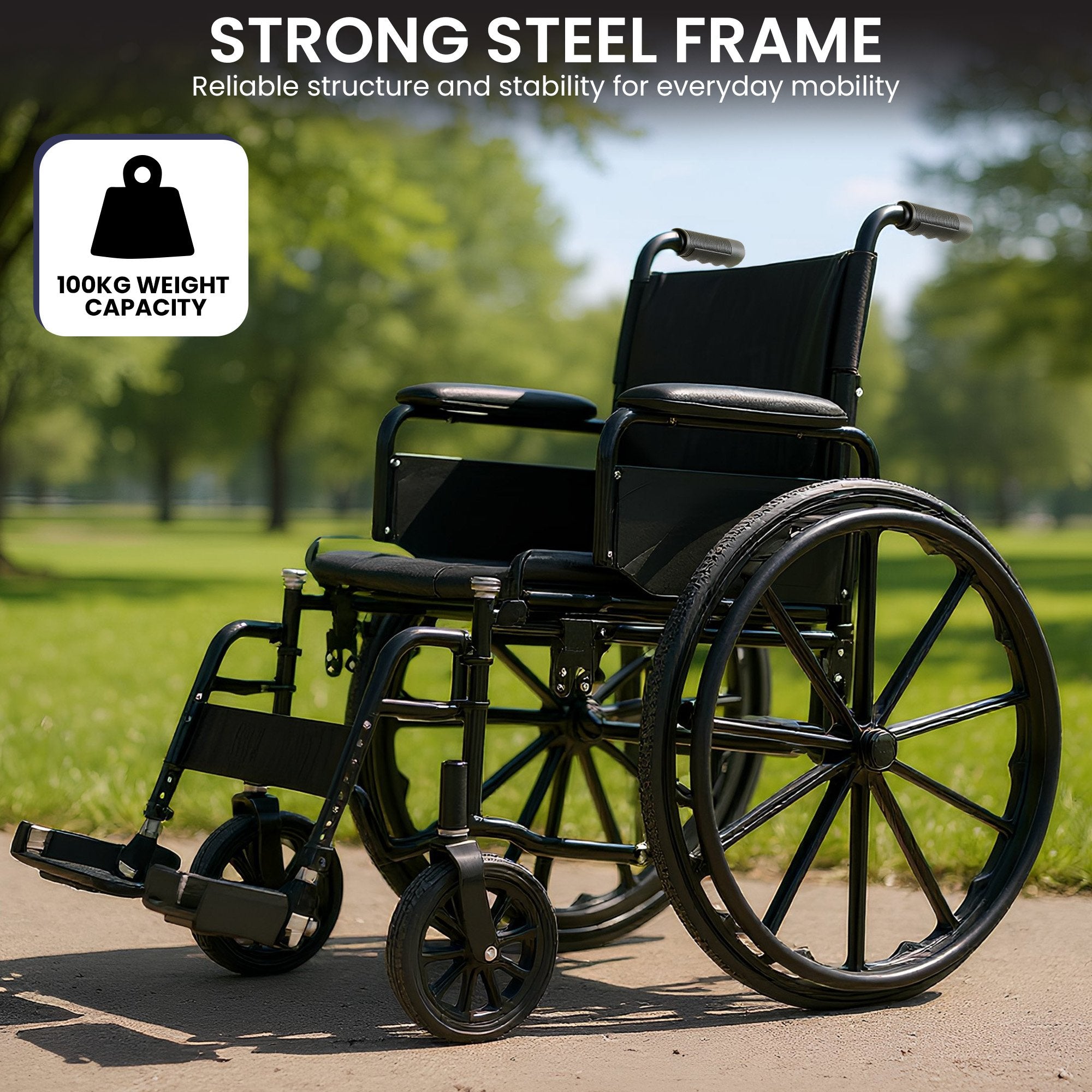 Black wheelchair with a strong steel frame on a paved path with greenery in the background