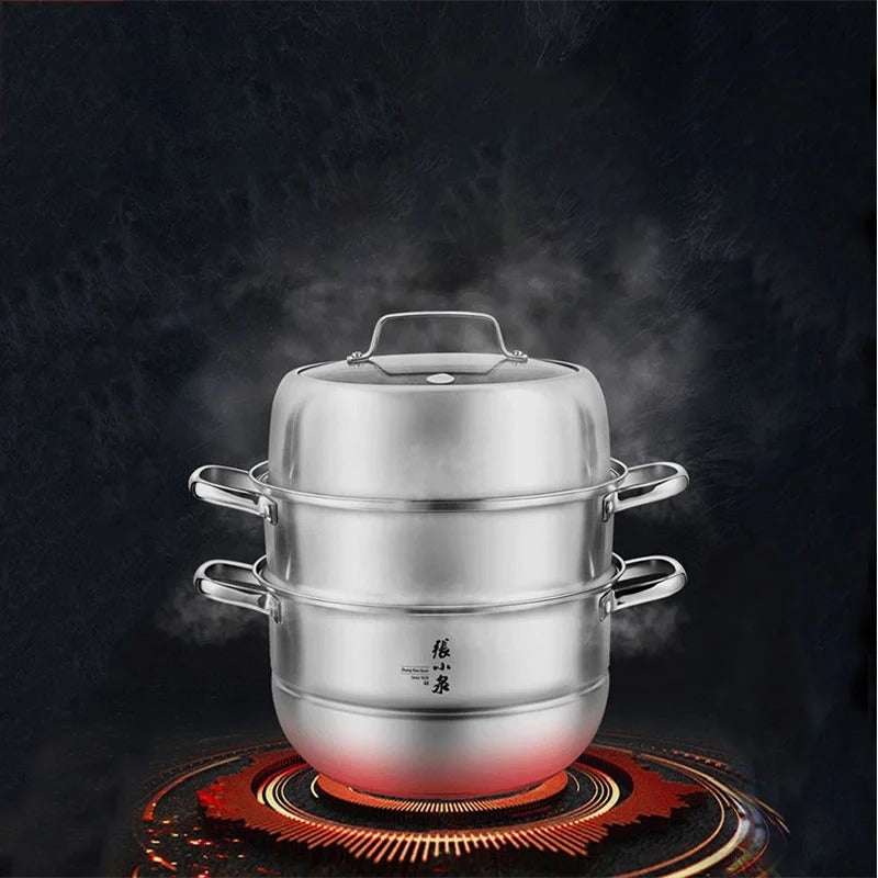 Stainless steel steamer pot with steam rising on a dark background