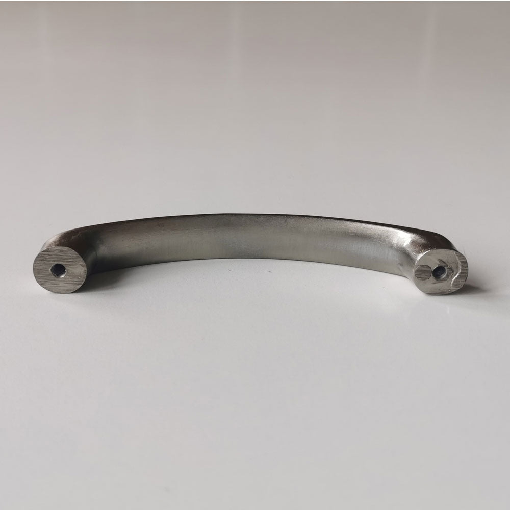 Metallic curved bar on a light gray background