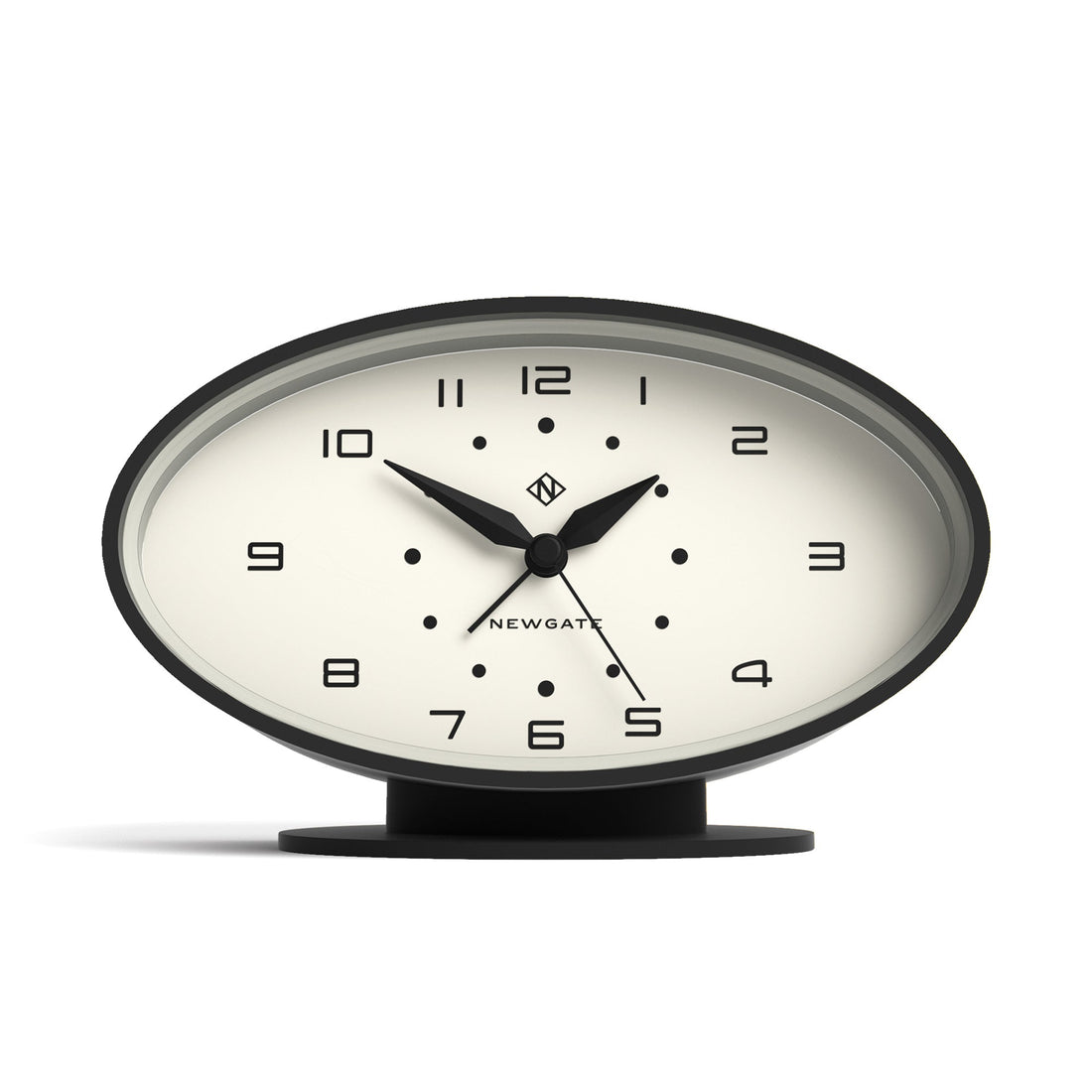 Table clock with black frame and white face on a white background