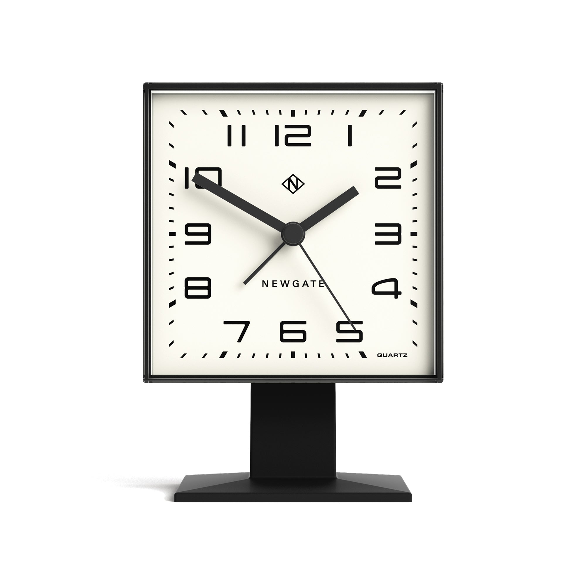 Square table clock with black frame and white face on a white background