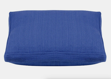 Blue pillow on a white background