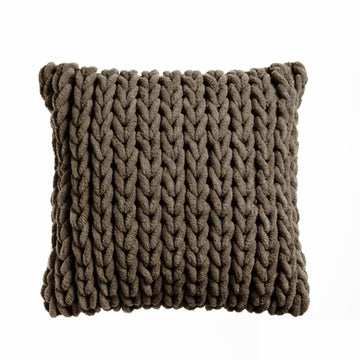 Brown textured pillow on a white background