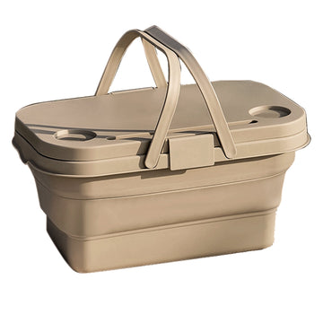 Beige collapsible basket with handles on a white background