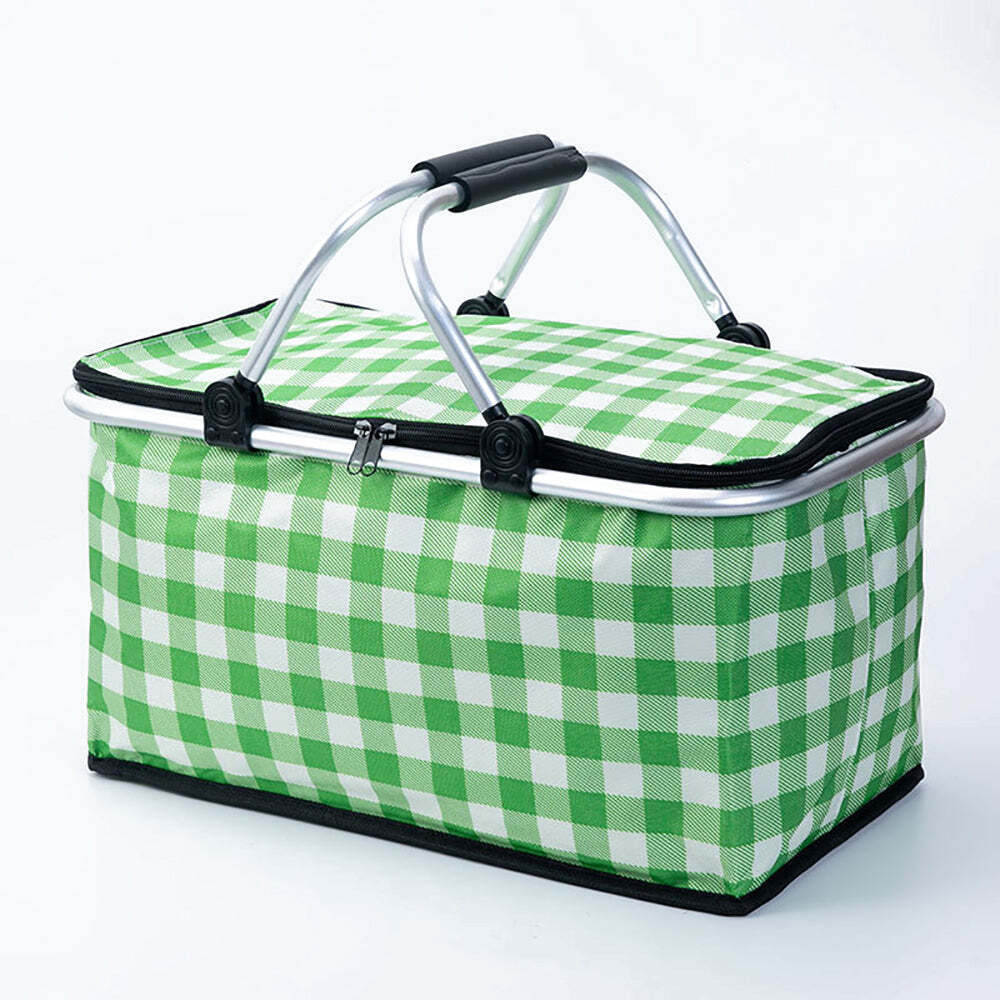 Green and white checkered picnic basket with a metal handle on a white background