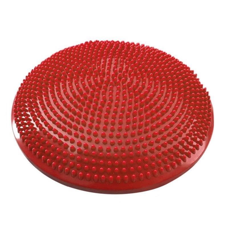 Red balance cushion with textured surface on a white background
